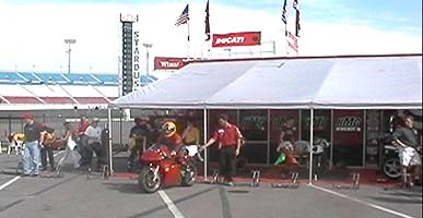 Debbie in front of the Ducati Racing truck